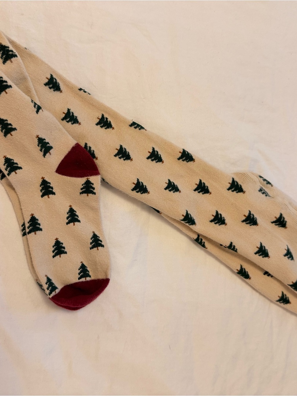 Little Stocking Co. beige cotton tights with Green Tree Pattern and Maroon Toe